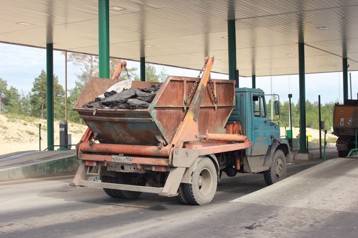 мусоровоз на игумновском полигоне