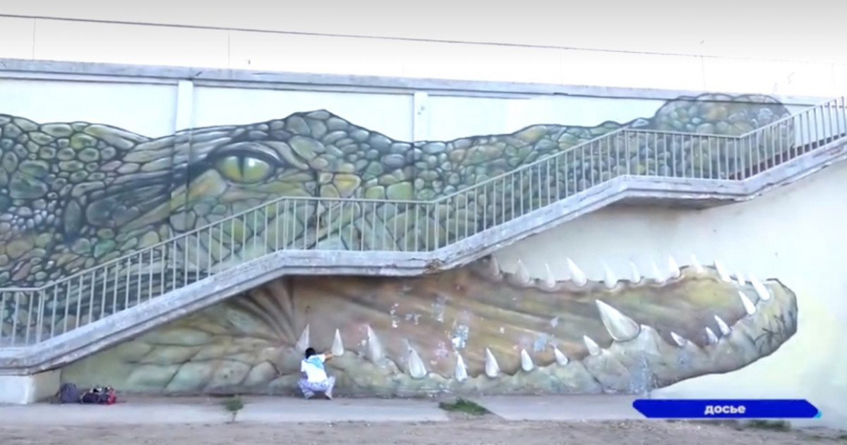 Граффити крокодила вернут на стену Канавинского моста
